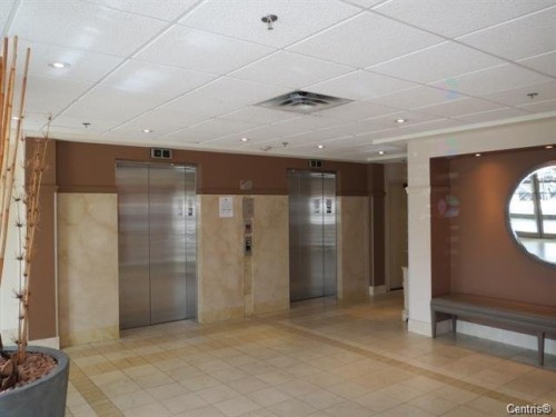 Elevator - 1420-7680 Boul. Marie-Victorin, Brossard, QC - Indoor Photo Showing Other Room