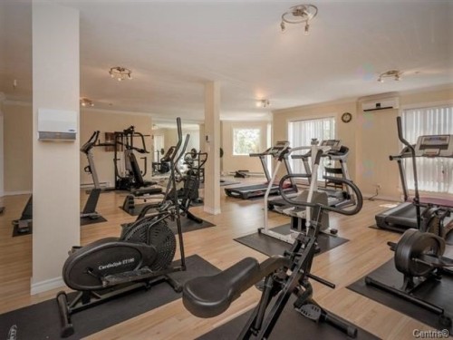 Exercise Room - 1420-7680 Boul. Marie-Victorin, Brossard, QC - Indoor Photo Showing Gym Room