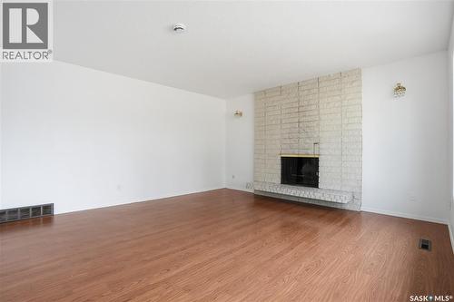 1044 East Centre, Saskatoon, SK - Indoor Photo Showing Living Room With Fireplace