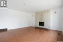 1044 East Centre, Saskatoon, SK  - Indoor Photo Showing Living Room With Fireplace 