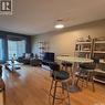 205 2244 Smith Street, Regina, SK  - Indoor Photo Showing Living Room 