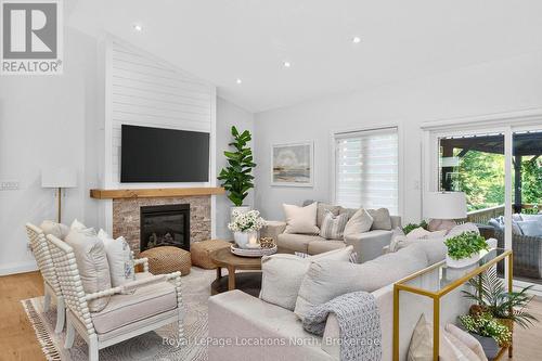 15 Pinecone Avenue, Tiny, ON - Indoor Photo Showing Living Room With Fireplace