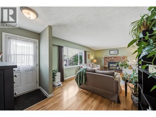 1125 Halston Avenue, Kamloops, BC - Indoor Photo Showing Living Room With Fireplace