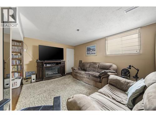 1125 Halston Avenue, Kamloops, BC - Indoor Photo Showing Living Room With Fireplace