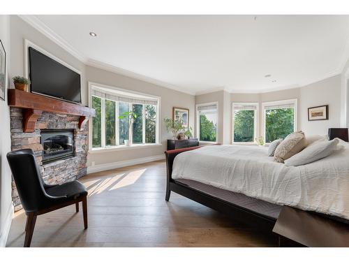 18638 54A Avenue, Surrey, BC - Indoor Photo Showing Bedroom With Fireplace