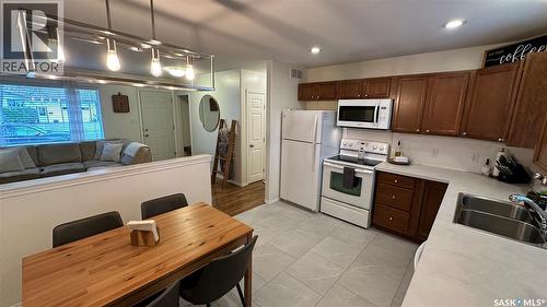 807 107Th Avenue, Tisdale, SK - Indoor Photo Showing Kitchen With Double Sink