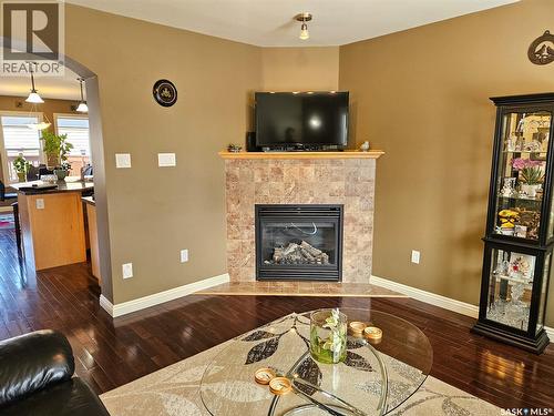 508 Thompson Street, Herbert, SK - Indoor Photo Showing Living Room With Fireplace
