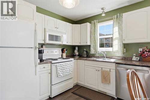 9 243 Herold Terrace, Saskatoon, SK - Indoor Photo Showing Kitchen With Double Sink