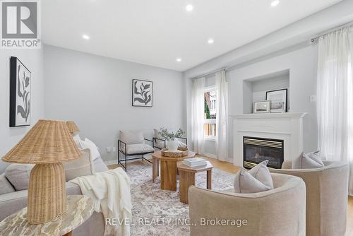 131 Rushworth Drive, Ajax, ON - Indoor Photo Showing Living Room With Fireplace
