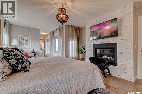 6224 8Th Avenue, Regina, SK - Indoor Photo Showing Bedroom With Fireplace