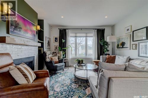 6224 8Th Avenue, Regina, SK - Indoor Photo Showing Living Room With Fireplace