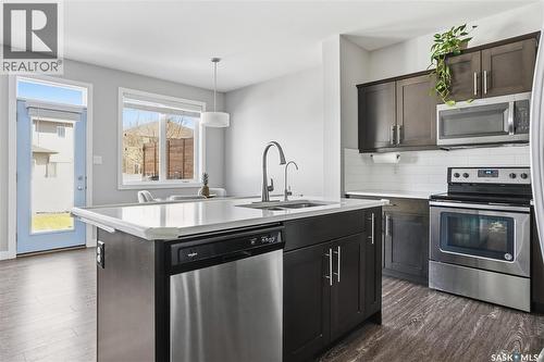 4810 Green Brooks Way E, Regina, SK - Indoor Photo Showing Kitchen With Stainless Steel Kitchen With Upgraded Kitchen
