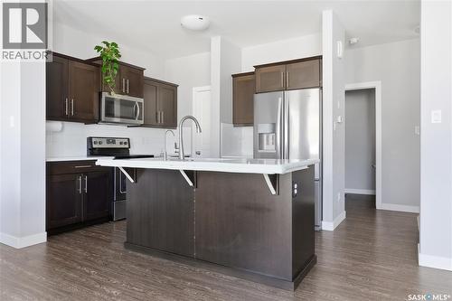 4810 Green Brooks Way E, Regina, SK - Indoor Photo Showing Kitchen With Stainless Steel Kitchen With Upgraded Kitchen