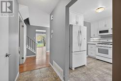 Foyer overlooking kitche/dining/living areas - 