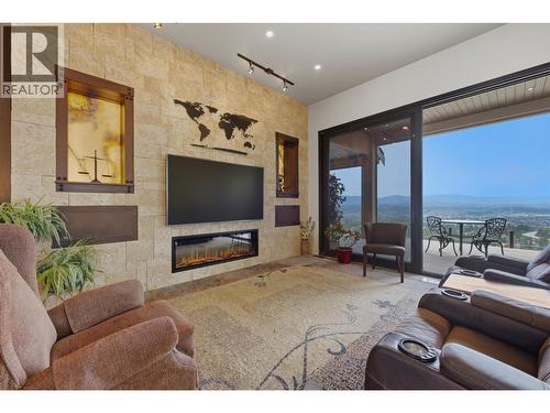 2200 Cortina Drive, Kelowna, BC - Indoor Photo Showing Living Room With Fireplace