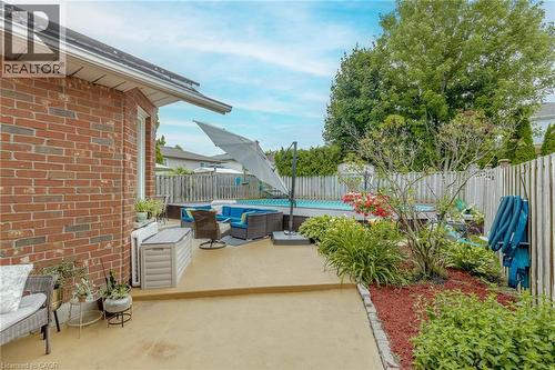 Fenced backyard featuring outdoor furniture and a patio - 32 Vineberg Drive, Hamilton, ON - Outdoor