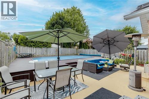 Fenced backyard featuring a patio area and an outdoor living / dining area - 32 Vineberg Drive, Hamilton, ON - Outdoor With Deck Patio Veranda