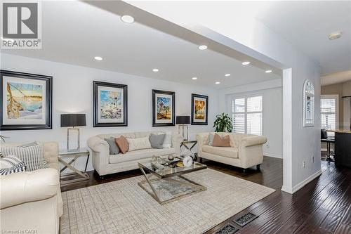 Living area featuring recessed lighting and dark wood-style flooring - 32 Vineberg Drive, Hamilton, ON - Indoor Photo Showing Living Room