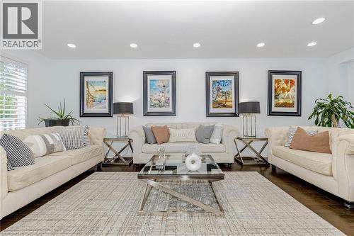 Living area featuring recessed lighting and dark wood-type flooring - 32 Vineberg Drive, Hamilton, ON - Indoor Photo Showing Living Room