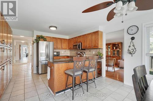 Solid Oak Cabinets with Wine cooler - 41 Framingham Crescent, Ottawa, ON - Indoor Photo Showing Kitchen