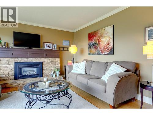 8308 Kalview Drive, Coldstream, BC - Indoor Photo Showing Living Room With Fireplace