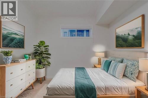 Bedroom featuring carpet - 25 Isherwood Avenue Unit# G-105, Cambridge, ON - Indoor Photo Showing Bedroom
