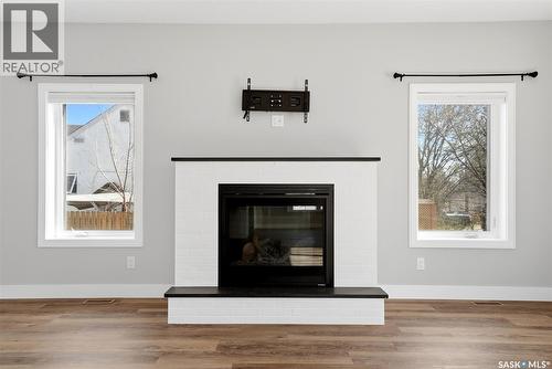 2100 Queen Street, Regina, SK - Indoor Photo Showing Living Room With Fireplace