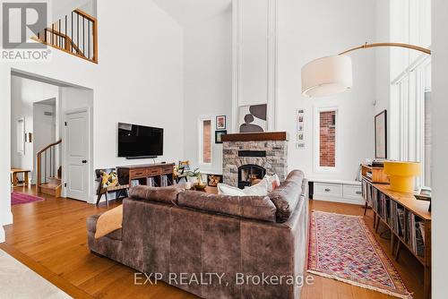 157 Ridgeview Drive, Mapleton, ON - Indoor Photo Showing Living Room With Fireplace