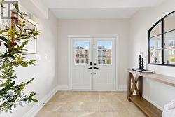 Large, 2-storey front foyer. - 