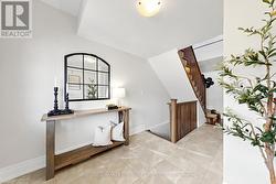 Basement and main floor access from the foyer. - 