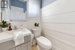 Beautifully upgraded main floor powder room. - 