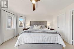 Accommodates a king sized bed with side tables. - 