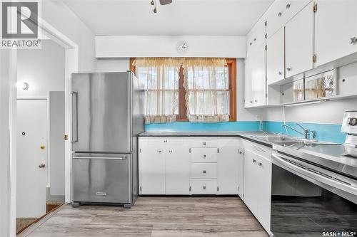 107 Cruise Street, Saskatoon, SK - Indoor Photo Showing Kitchen With Double Sink