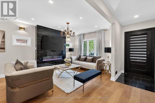 1 Wanless Crescent, Toronto, ON - Indoor Photo Showing Living Room With Fireplace