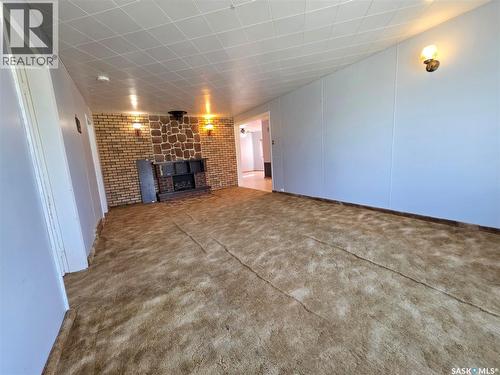 111 Warwick Street, Neville, SK - Indoor With Fireplace