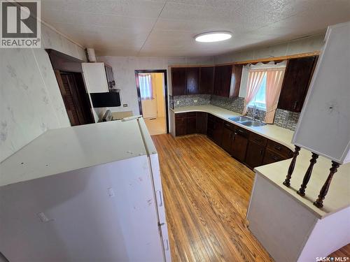111 Warwick Street, Neville, SK - Indoor Photo Showing Kitchen With Double Sink