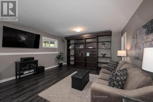 Lower Level Family Room w/ Murphy Bed - 59 Orchard Street, London South (South E), ON - Indoor Photo Showing Living Room