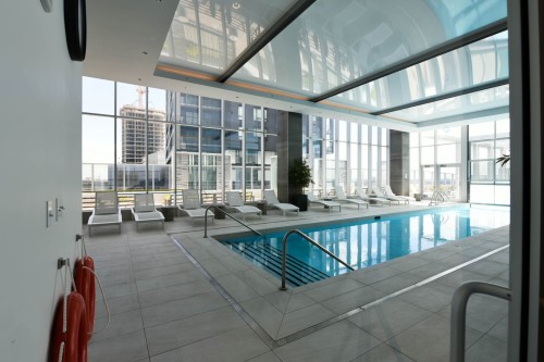 Pool - 2707-1050 Rue Drummond, Montréal (Ville-Marie), QC - Indoor Photo Showing Other Room With In Ground Pool