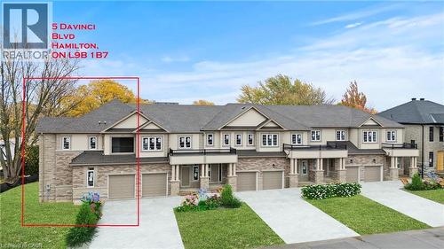 Contemporary townhome exterior featuring a combination of light-colored siding and stone veneer - 5 Davinci Boulevard, Hamilton, ON - Outdoor With Balcony With Facade