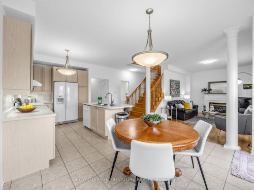 74 Styles Crescent, Ajax, ON - Indoor Photo Showing Dining Room With Fireplace