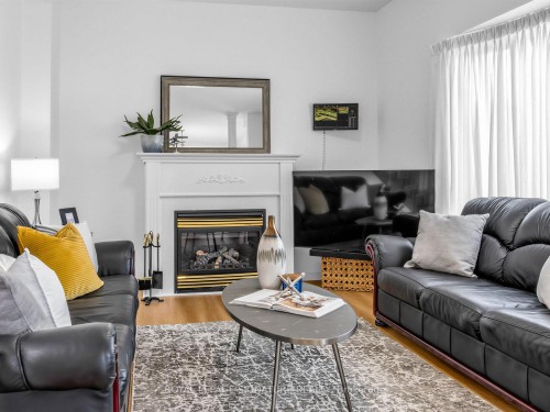 74 Styles Crescent, Ajax, ON - Indoor Photo Showing Living Room With Fireplace