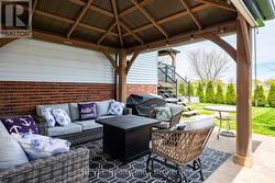 Gazebo area at side of house. - 