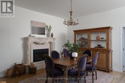 1198 Tiny Beaches Road N, Tiny, ON - Indoor Photo Showing Dining Room With Fireplace