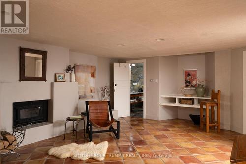 1198 Tiny Beaches Road N, Tiny, ON - Indoor Photo Showing Living Room With Fireplace