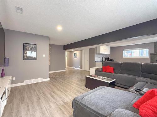 Family Room - 12 Dominion Way, Brandon, MB - Indoor Photo Showing Living Room