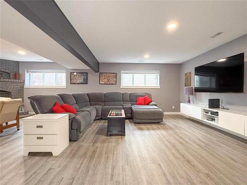 TV Console included - 12 Dominion Way, Brandon, MB - Indoor Photo Showing Living Room