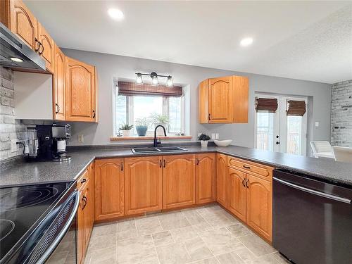 12 Dominion Way, Brandon, MB - Indoor Photo Showing Kitchen With Double Sink