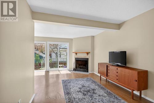 39 Saxton Private, Ottawa, ON - Indoor Photo Showing Other Room With Fireplace