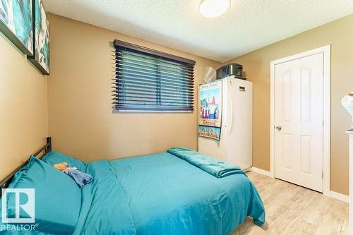 7012 44 Av Nw, Edmonton, AB - Indoor Photo Showing Bedroom