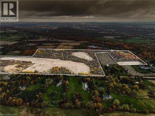 Expansive aerial showcasing a significant land parcel with defined boundaries - 3415 Cedar Springs Road, Burlington, ON 